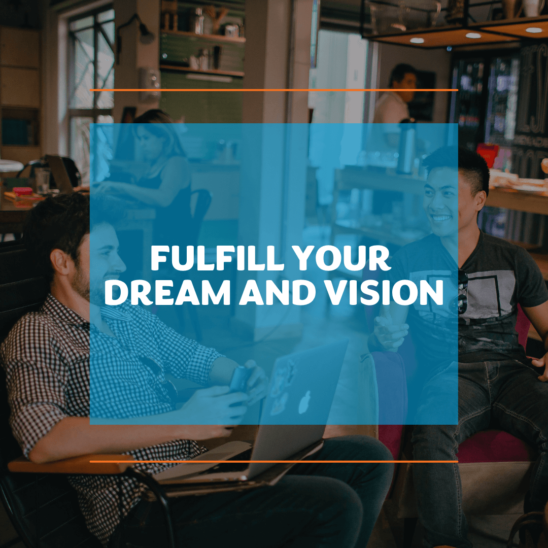 Two people smiling and having a discussion in a modern office with laptops. Blue overlay text reads, “Fulfill Your Dream and Vision.” The scene feels collaborative.